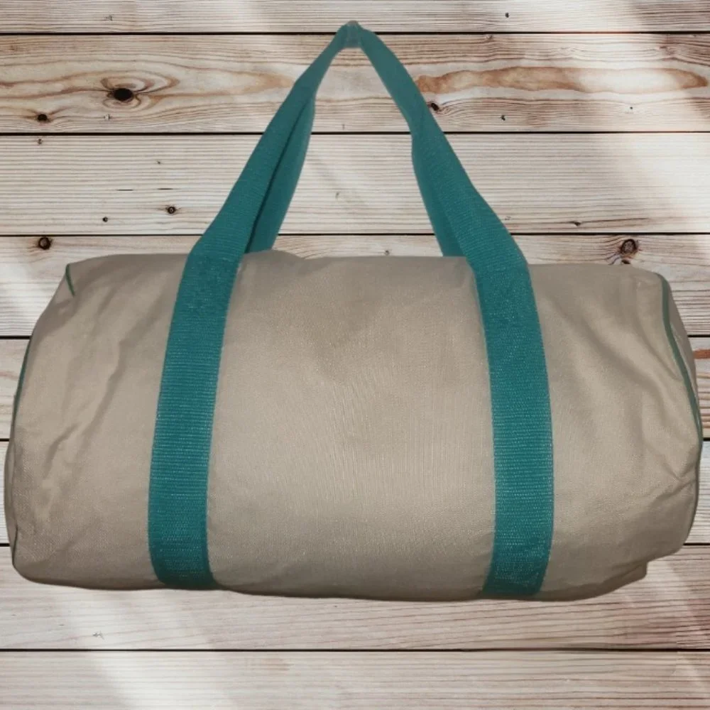 HAWAII WORLD - Vintage UNITED AIRLINES White Teal Strap Carry-On Duffle Bag